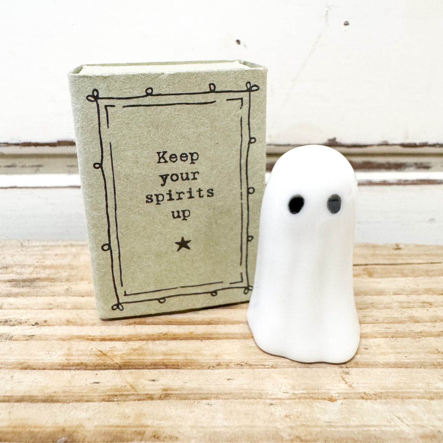 Heaven in Earth - Matchbox Ghost - a porcelain Ghost in a matchbox that reads "Keep your spirits up"