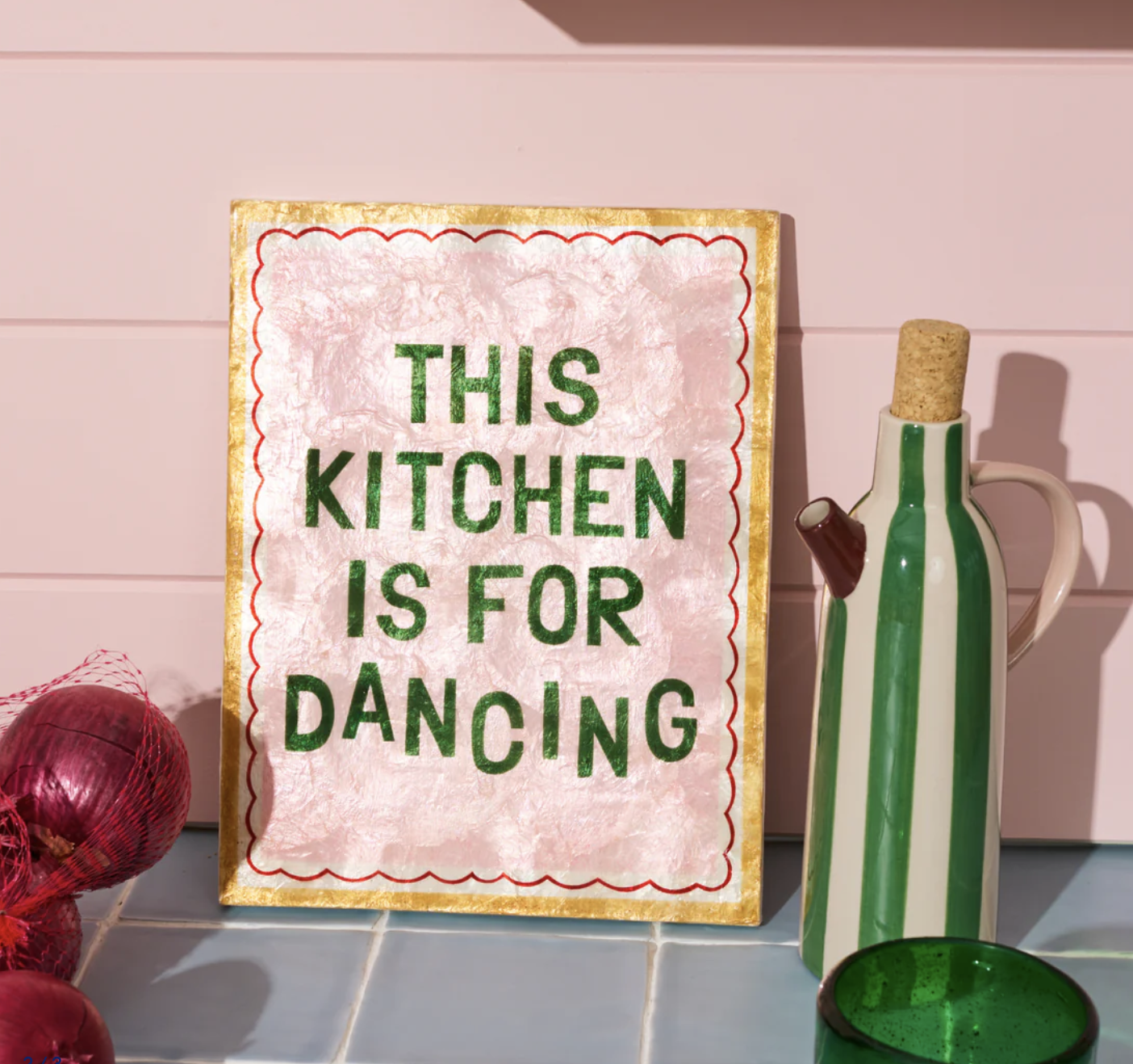 Decorative sign with 'This kitchen is for dancing' text on a pink background, Jones & Co - Fun House Kitchen Tile