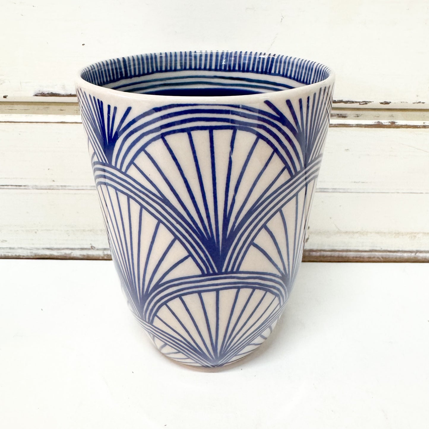 Jones & Co Caravan Cup - Indigo tumbler style ceramic cup with hand painted blue fan design