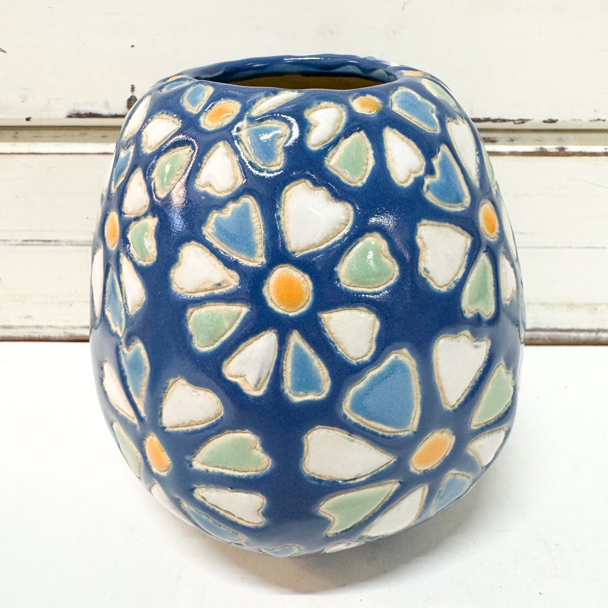 Jones & Co Pollen Blue Daisy Vase - short blue ceramic vase with flowers