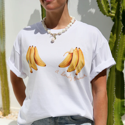 WHITE TEE SHIRT WITH BANANAS AND READS "A LOVELY BUNCH"
