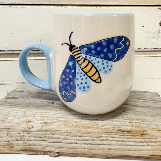 Jones and Co ceramic mug with handpainted blue moth