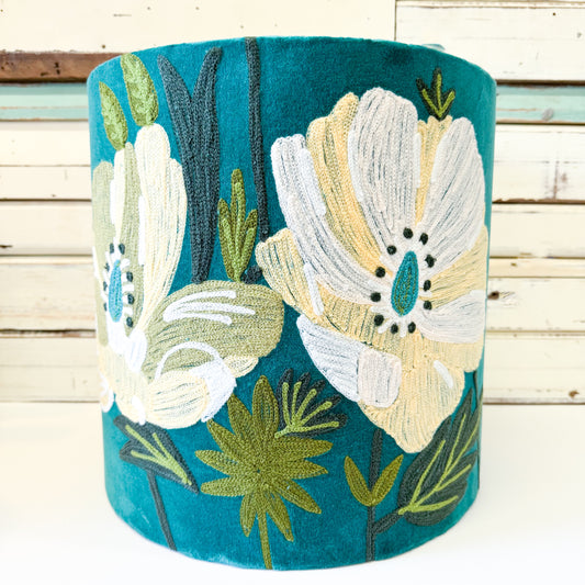 Decorative cylindrical pillow with floral embroidery