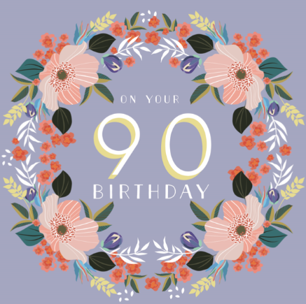 A printed 90th birthday card with a floral design and the number 90 on it.