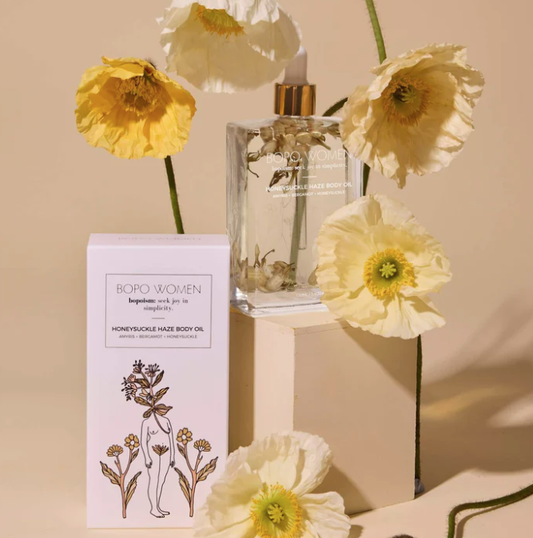 BOPO_WOMEN_Honeysuckle_Haze_Body_Oil An all natural, deeply hydrating body oil featuring a grounding blend of elegant essential oils. Available at The Brightside Store.