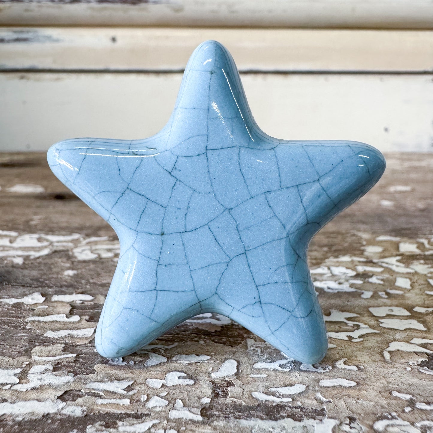 Blue ceramic star-shaped DOORKNOB with crackle effect