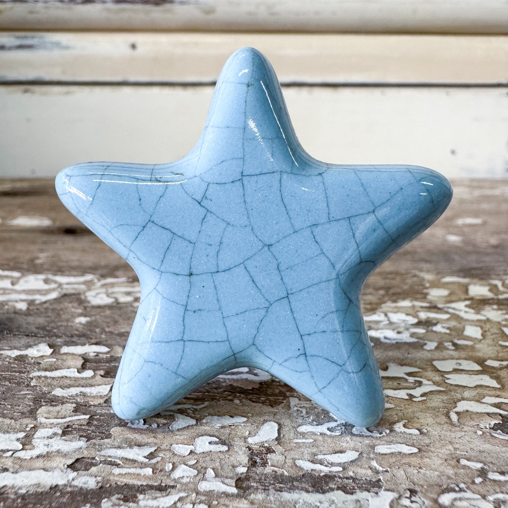 Blue ceramic star-shaped DOORKNOB with crackle effect