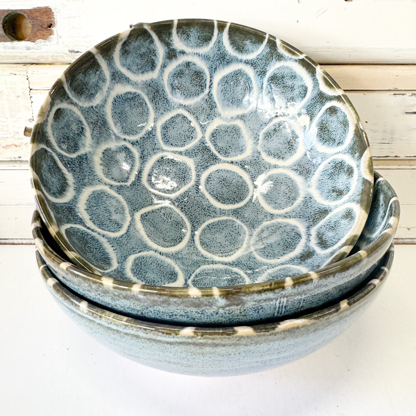 Japanese ceramic bowls with a white ring pattern on indigo blue, finished with a semi gloss glaze.
