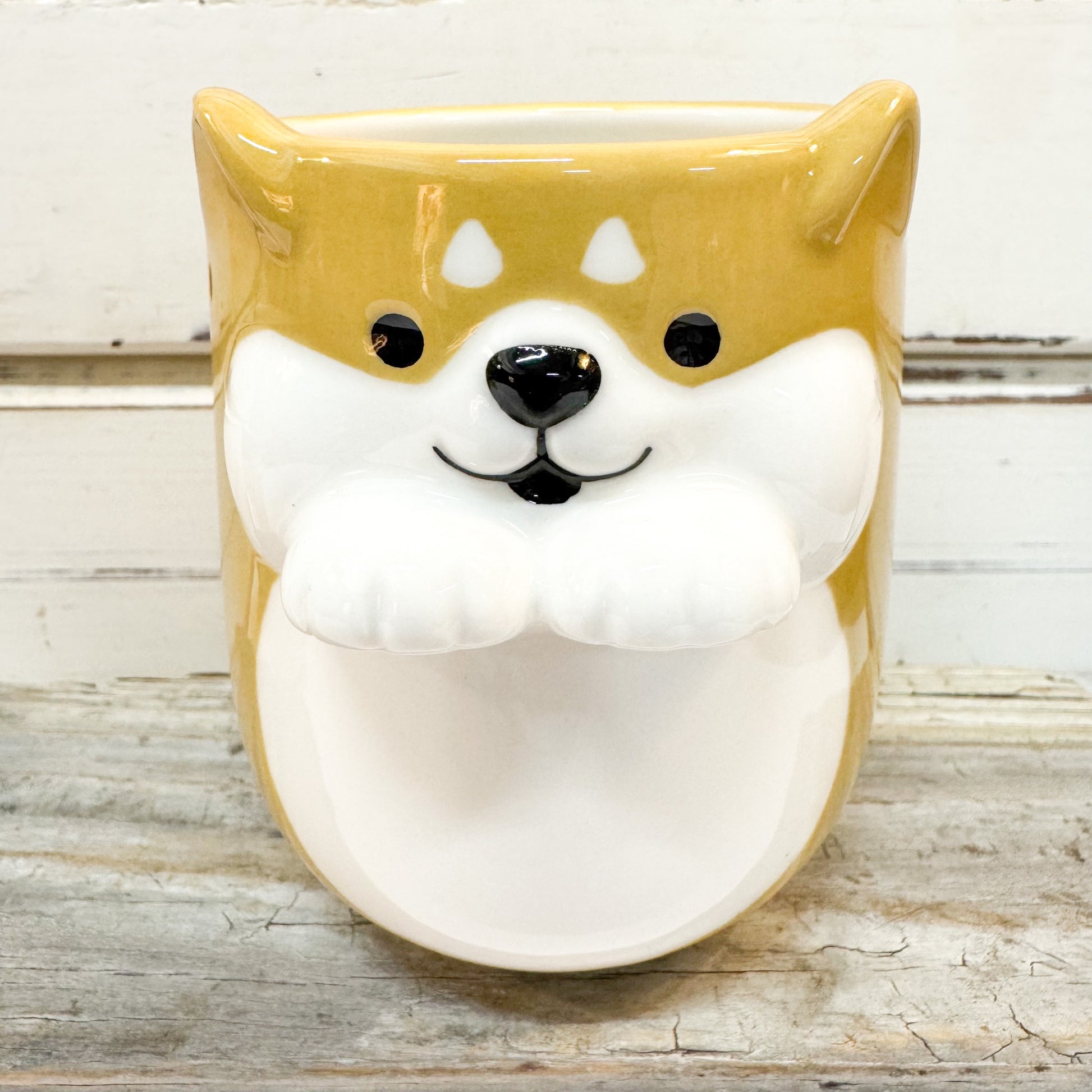 Concept Japan - Shiba Dog Cup. Ceramic dog-shaped cup with a smiling face