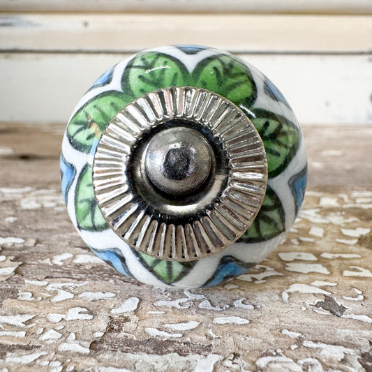 Decorative ceramic knob with green leaf and blue pattern 