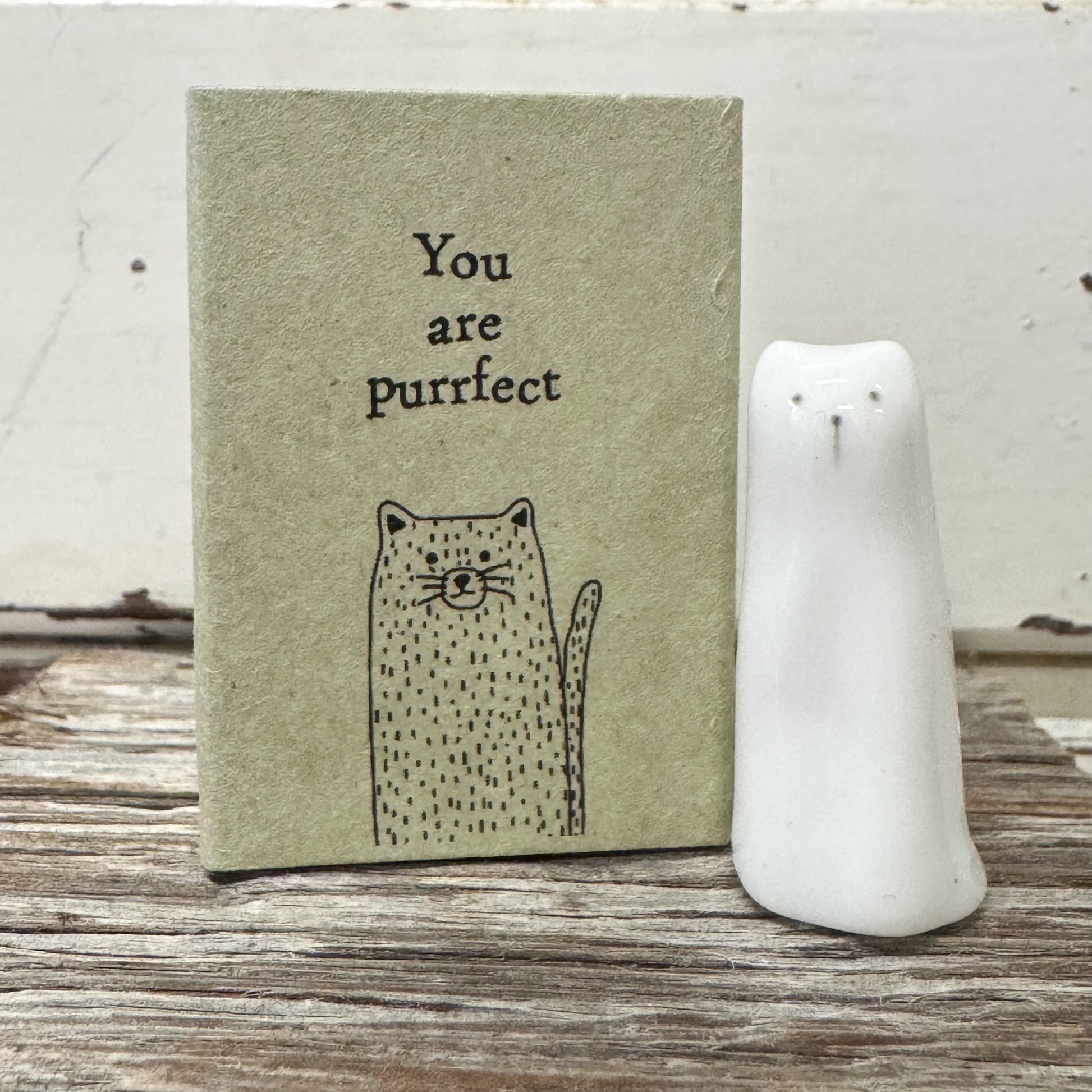 Heaven in Earth - Matchbox Tall Cat - white porcelain cat next to packaging matchbox with text that reads "you are purrfect"