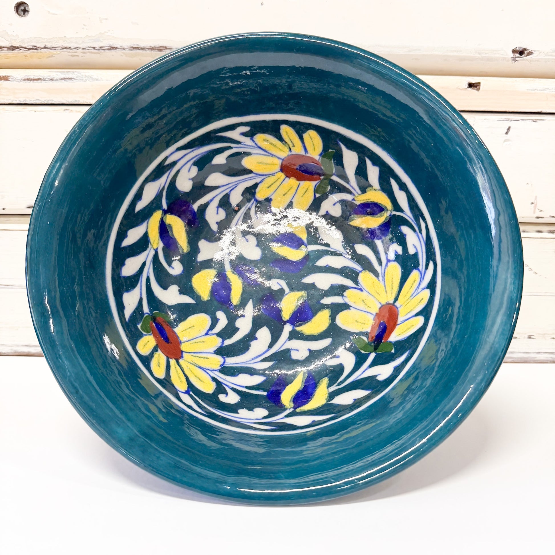 Indian Ceramics - Buttercup Bowl 19cm. Green turquoise ceramic bowl with floral patterns 