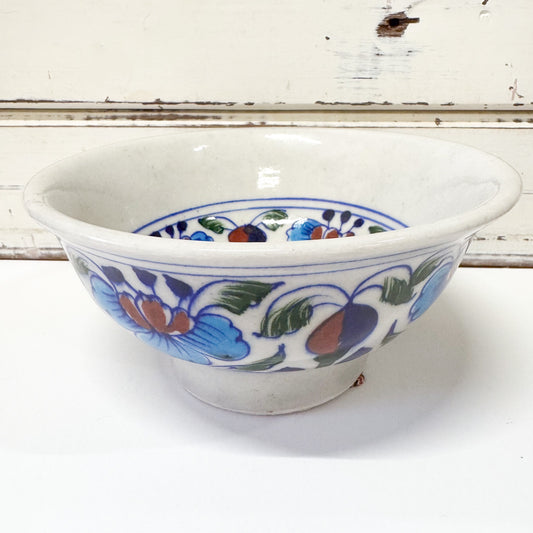 Indian Ceramics - Himalayan Blue Bowl 17cm. Ceramic bowl with floral patterns on a white background