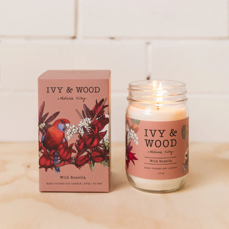 Ivy & Wood - Wild Rosella Candle and packaging on a light surface with a tiled wall background