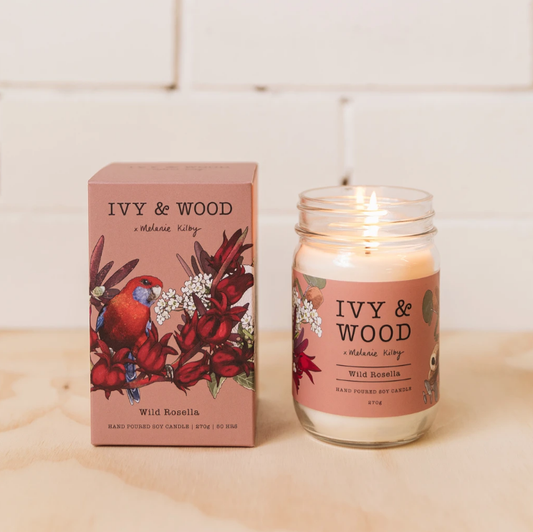 Ivy & Wood - Wild Rosella Candle and packaging on a light surface with a tiled wall background