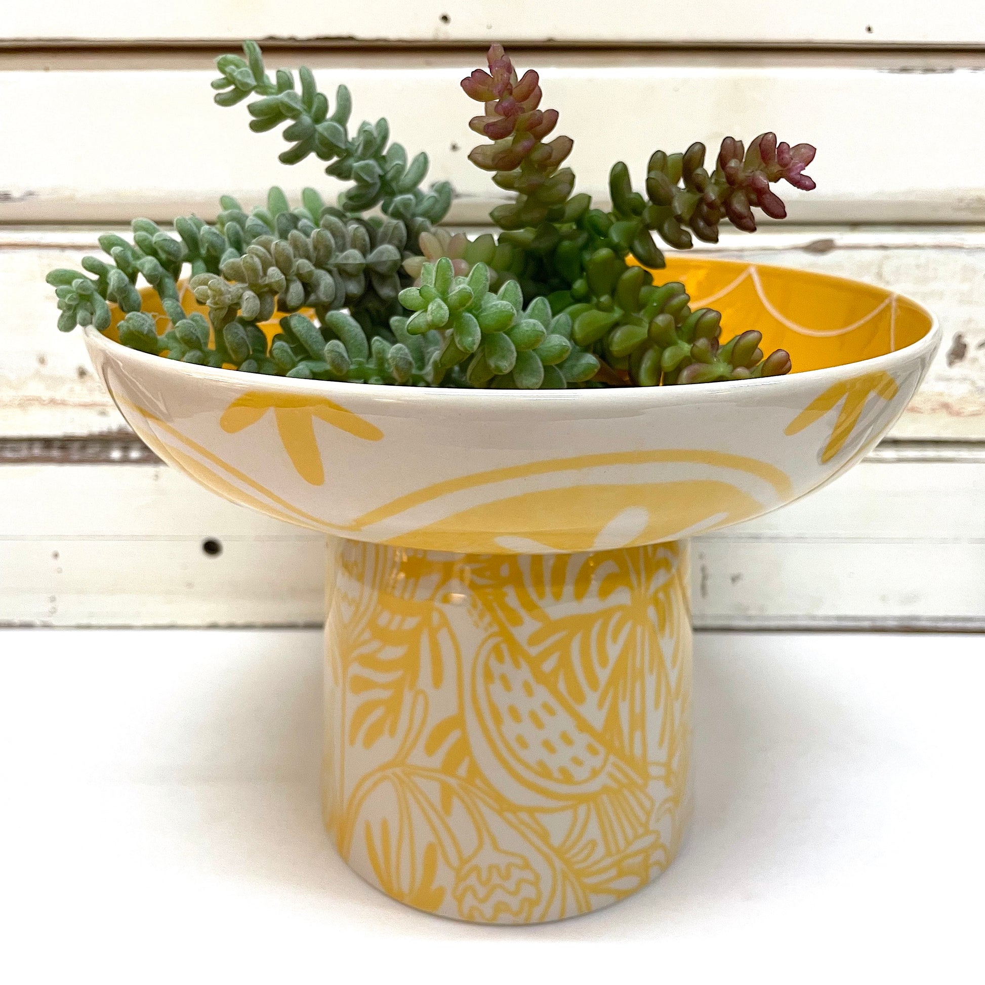 JONES AND CO CERAMIC FOOTED PLATTER BOWL IN YELLOW