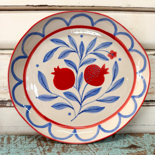 Ceramic plate with red pomegranate and blue leaf design - Jones & Co - Granada Plate