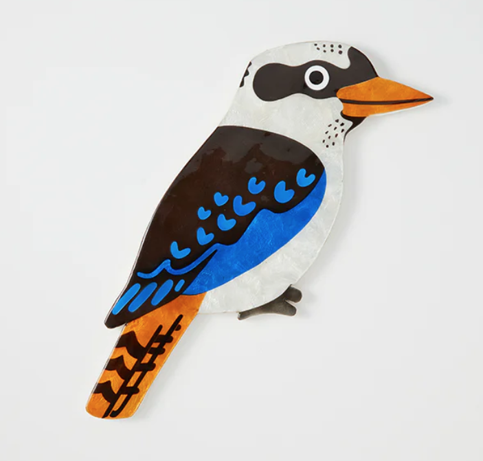 A hand-painted glossy Capiz shell wall tile in the shape of a Kookaburra bird with blue, black, orange, and white colours - Jones & Co - Aerial Kookaburra