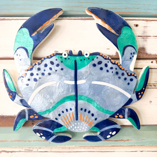 Decorative crab wall art with blue, green, and orange colours. Jones & Co - Beach Club Blue Crab Available at The Brightside Store