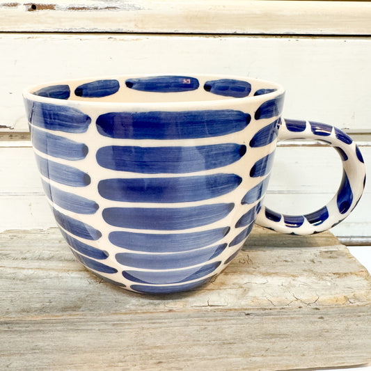Blue and white ceramic mug with a paint brush stroke stripe. Jones & Co - Boss Chino Mug - Blue Stripe