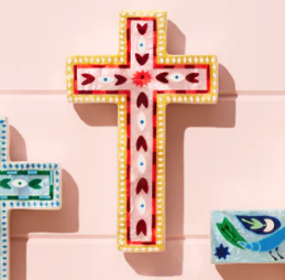 Decorative cross with colorful patterns on a pink background- Jones & Co - Fable Pink Cross