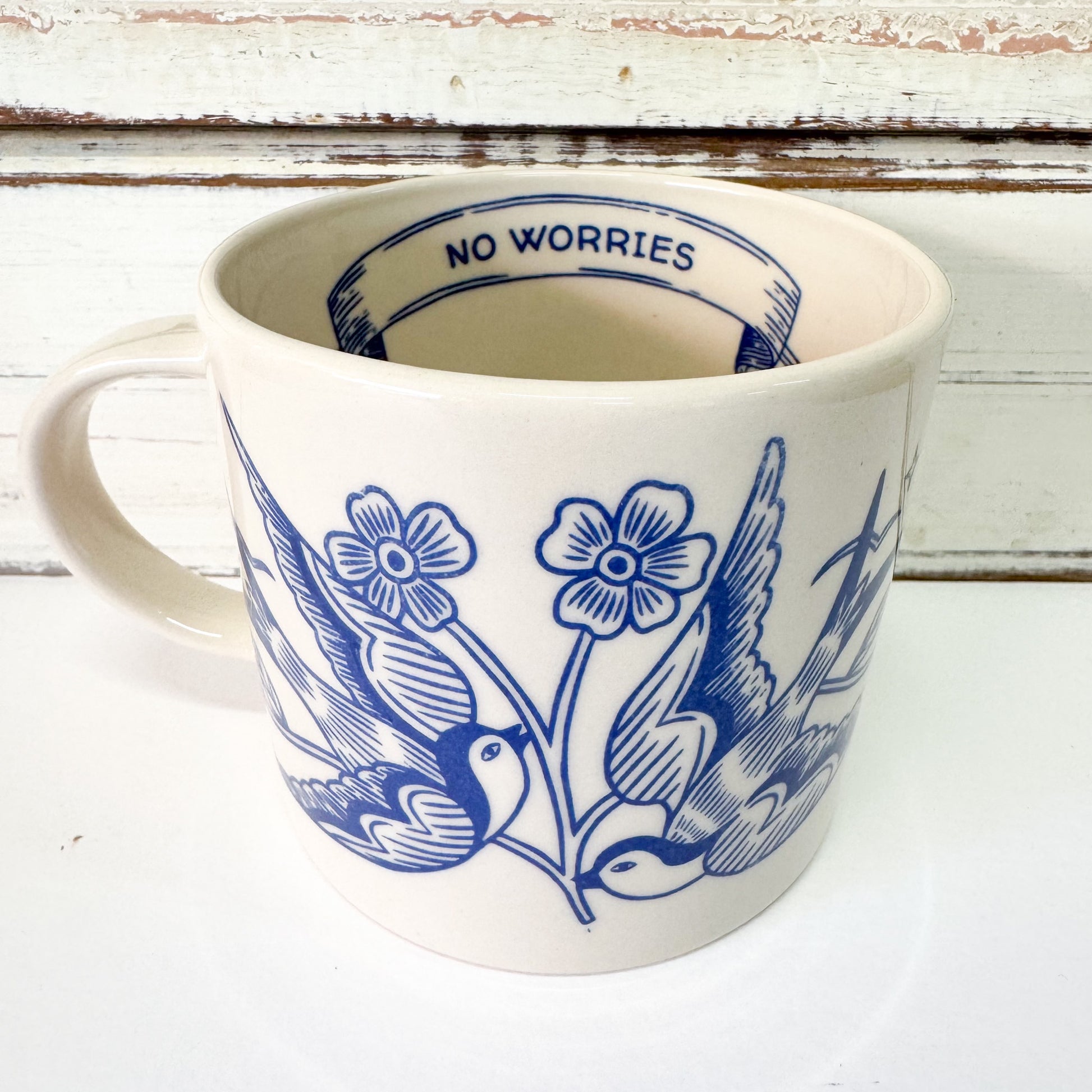 White mug with blue floral and bird design, 'No Worries' inside,-Jones & Co - Inked Mug - No Worries