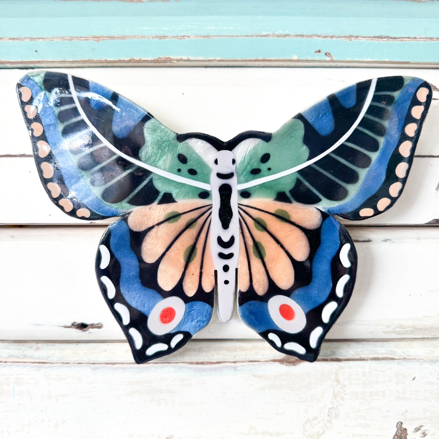 Butterfly capiz shell wall art with colourful wings. Jones & Co - Canopy Butterfly Blue