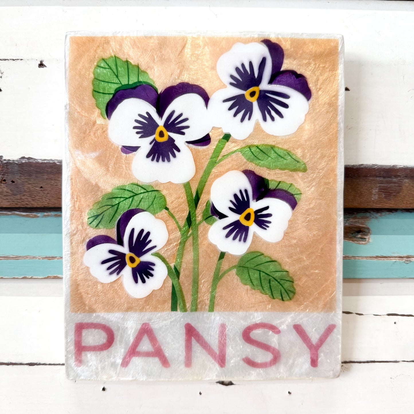 Jones & Co | Market Wall Art Pansy Decorative cAPIZ SHELL TILE with a floral Pansy  design on a white background