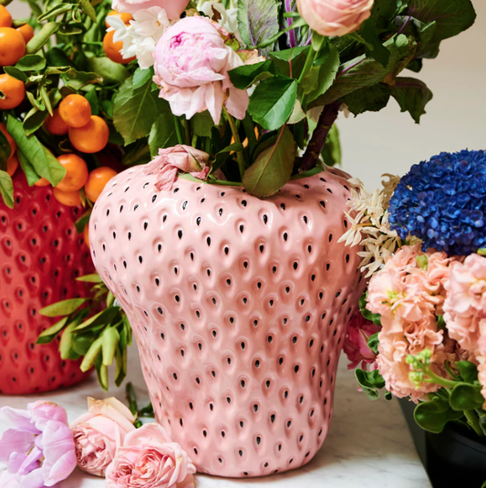 Kip&Co Strawberry Vase. A large light pink strawberry shaped vase in high fired ceramic with black pips.