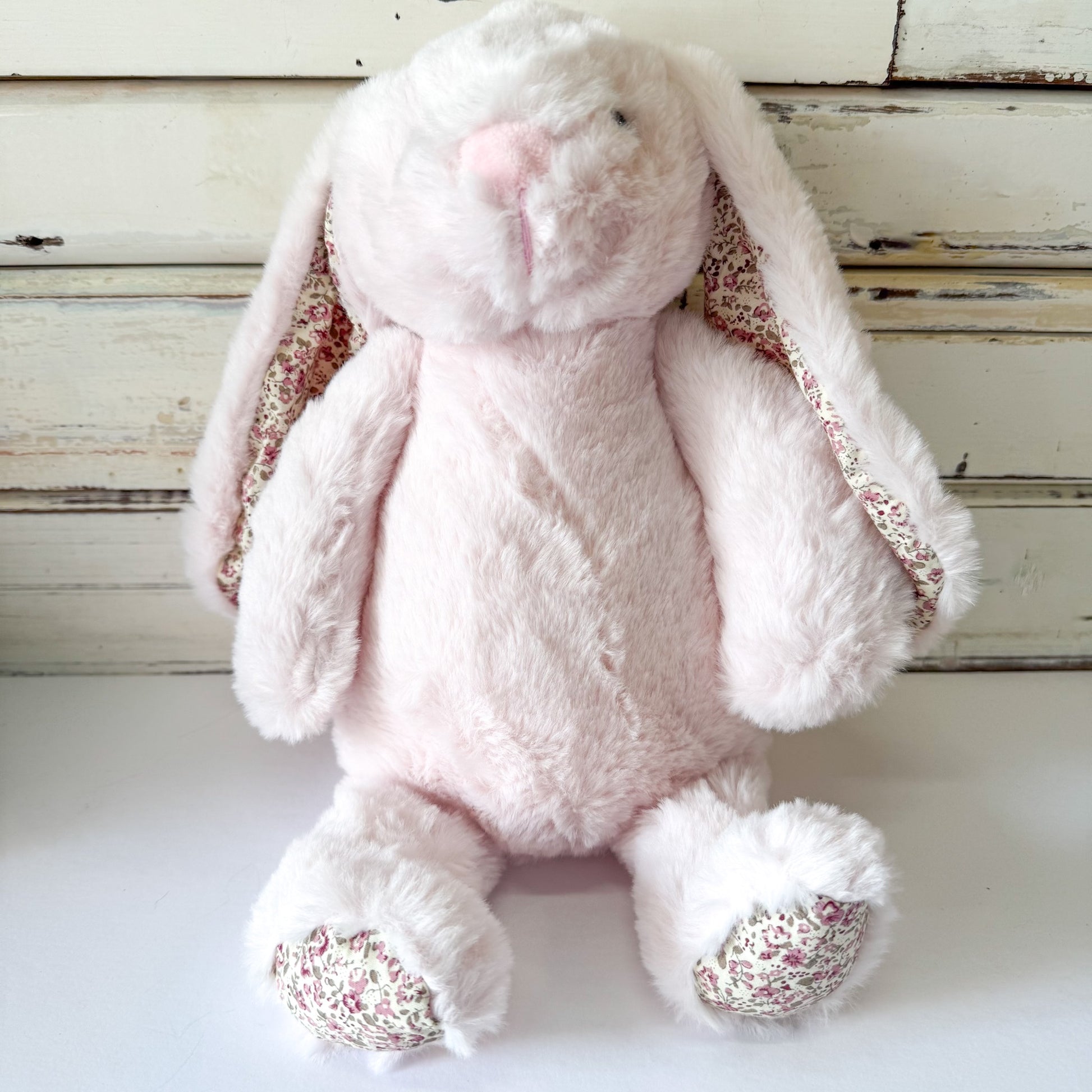 Lily & George - Sweet Pink Flopsy Bunny. Pink plush bunny toy with floral details on ears and feet