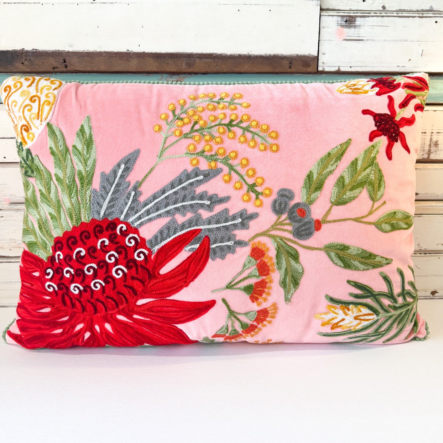 Decorative pillow with floral embroidery on a pink background - Ruby Star | Native Garden Cushion