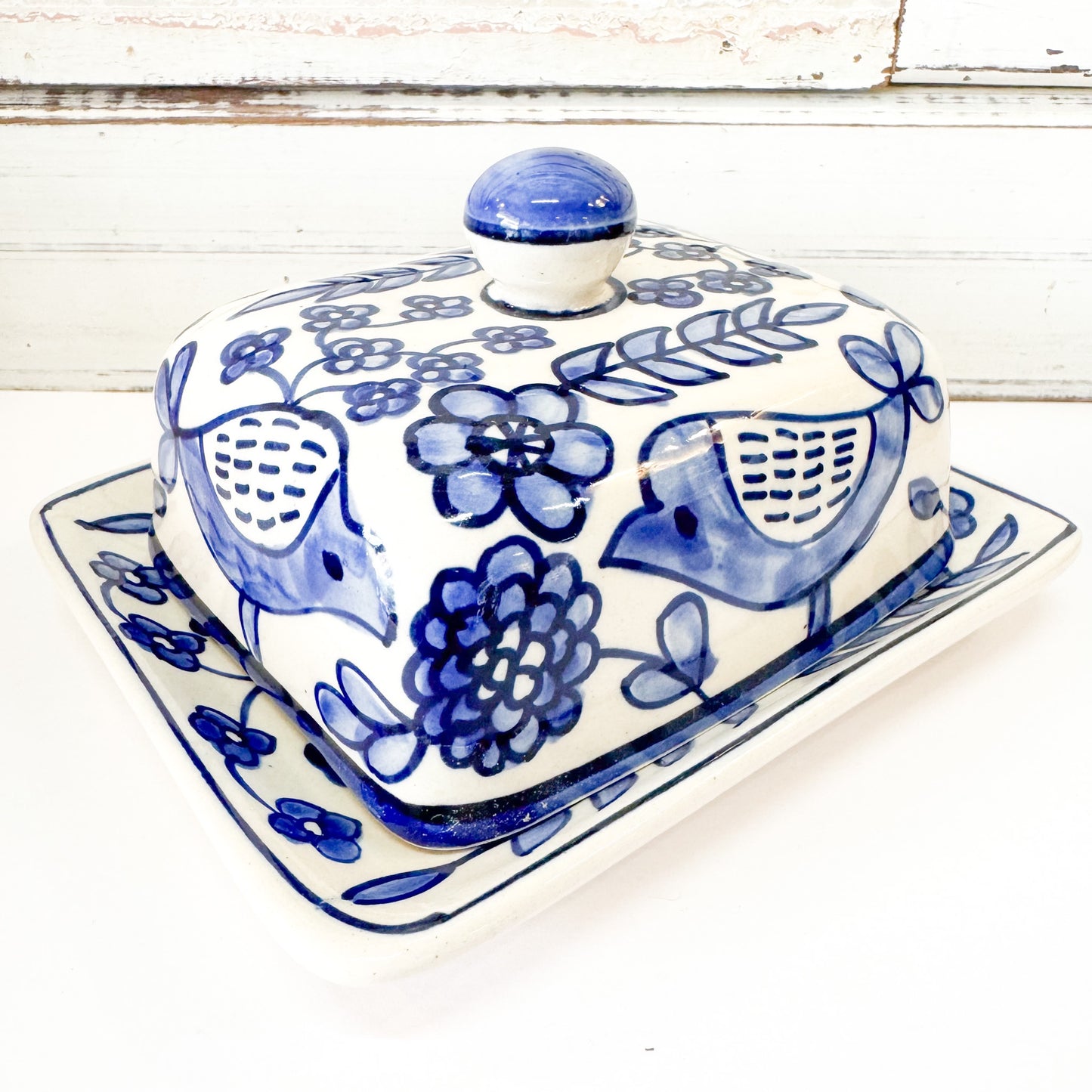 Status Collections - Blue Bird Butter Dish. Blue and white ceramic butter dish with floral and bird patterns 