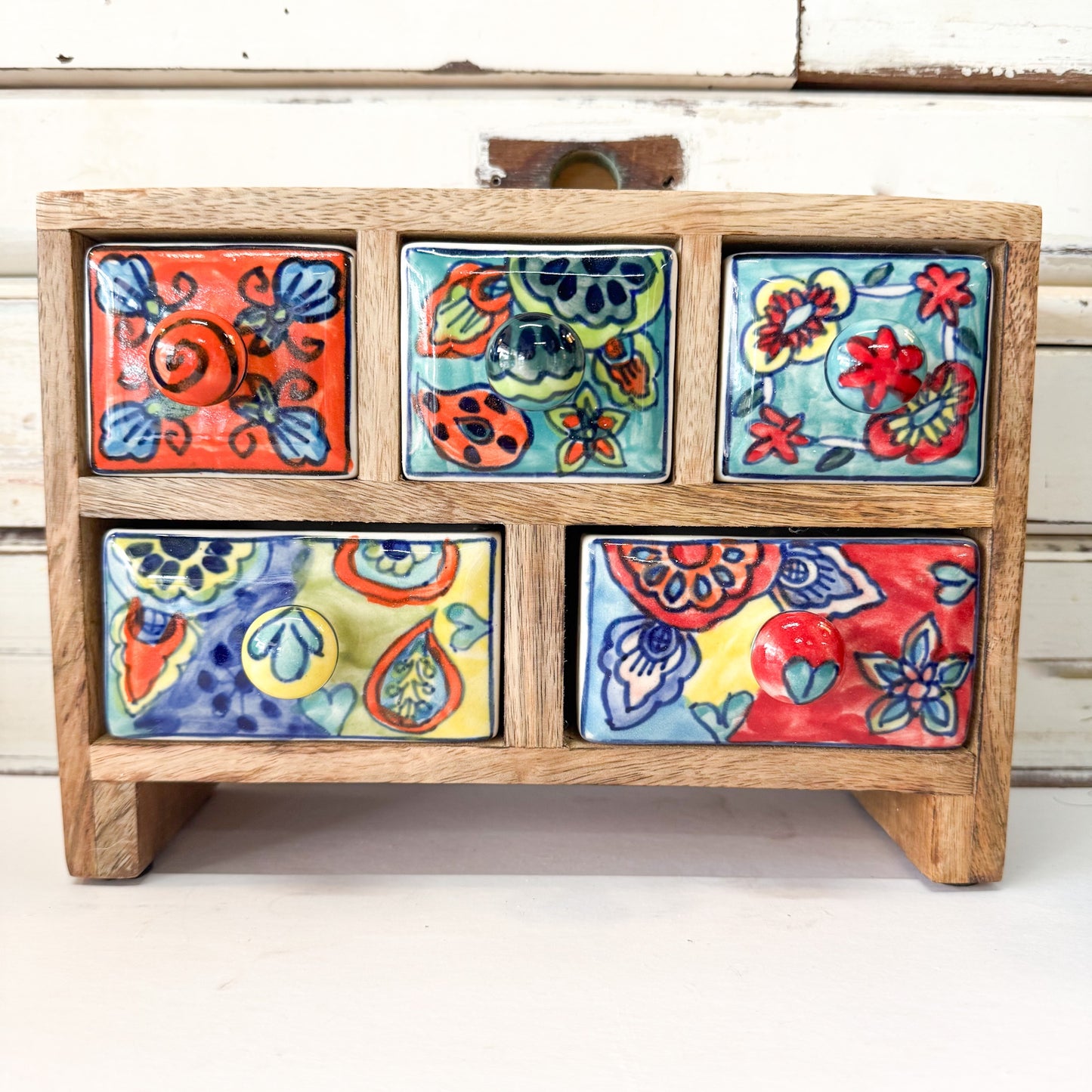 Status Collections - Floral 5 Drawer Box. Wooden box with ceramic tiles featuring floral designs 