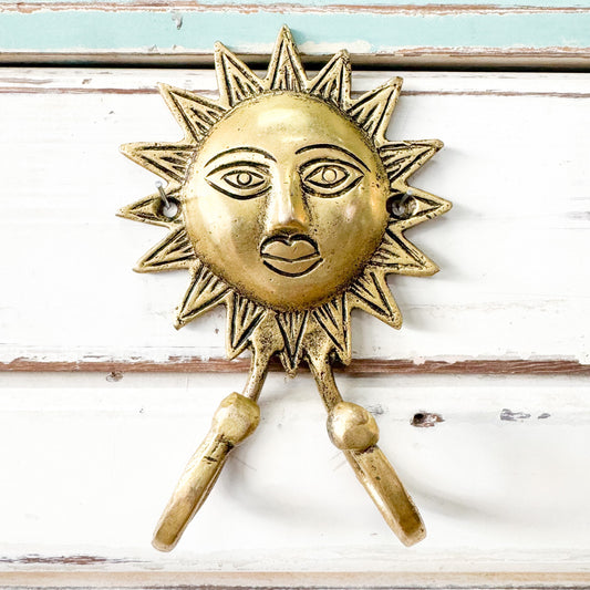 Shiny gold sun with two hooks 