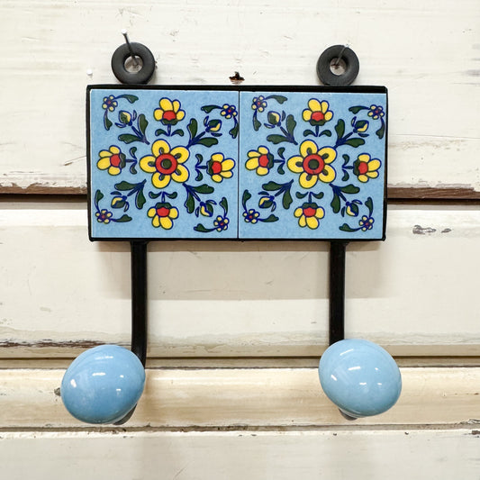 Decorative TILE wall hook with floral design and blue knobs 