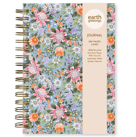 Floral-patterned journal with 'earth greetings' branding on a white background
