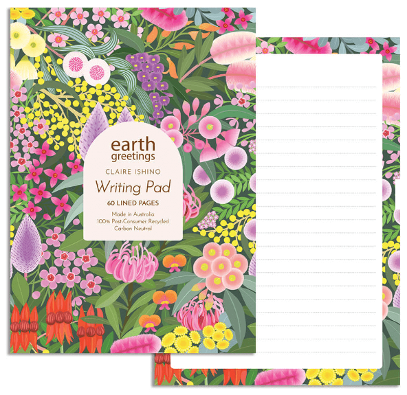 Writing pad with floral design and visible brand label on a white background
