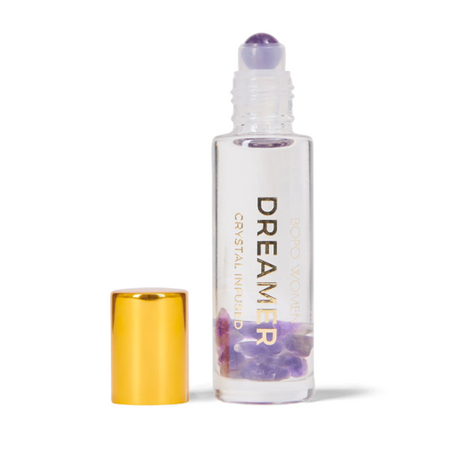 A crystal infused essential oil blend to calm the mind, relax the body and support peaceful sleep. Available at The Brightside Store.