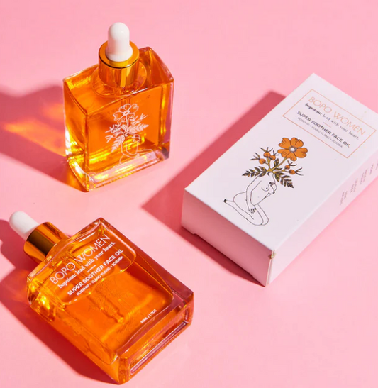  Super Soother Face Oil with orange tinted packaging, 