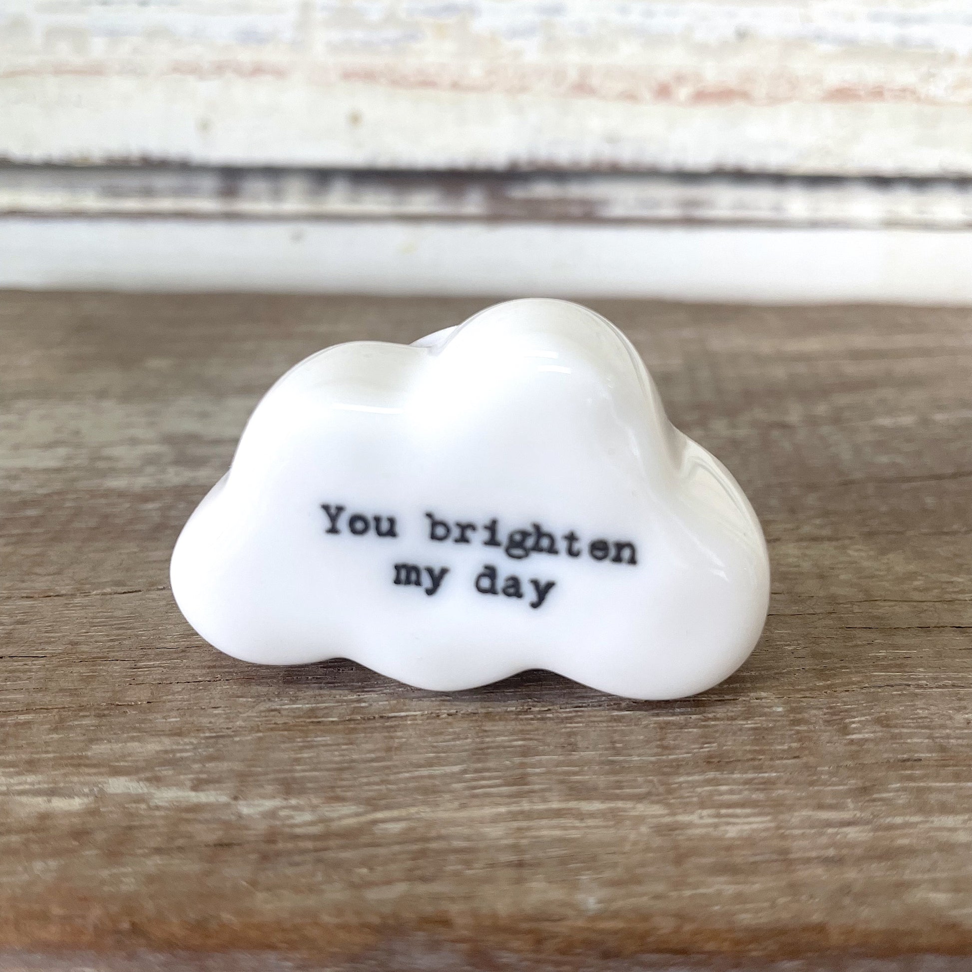 Heaven in Earth - Brighten My Day Porcelain Cloud A white porcelain cloud ornament with the text 'You Brighten My Day' printed on it