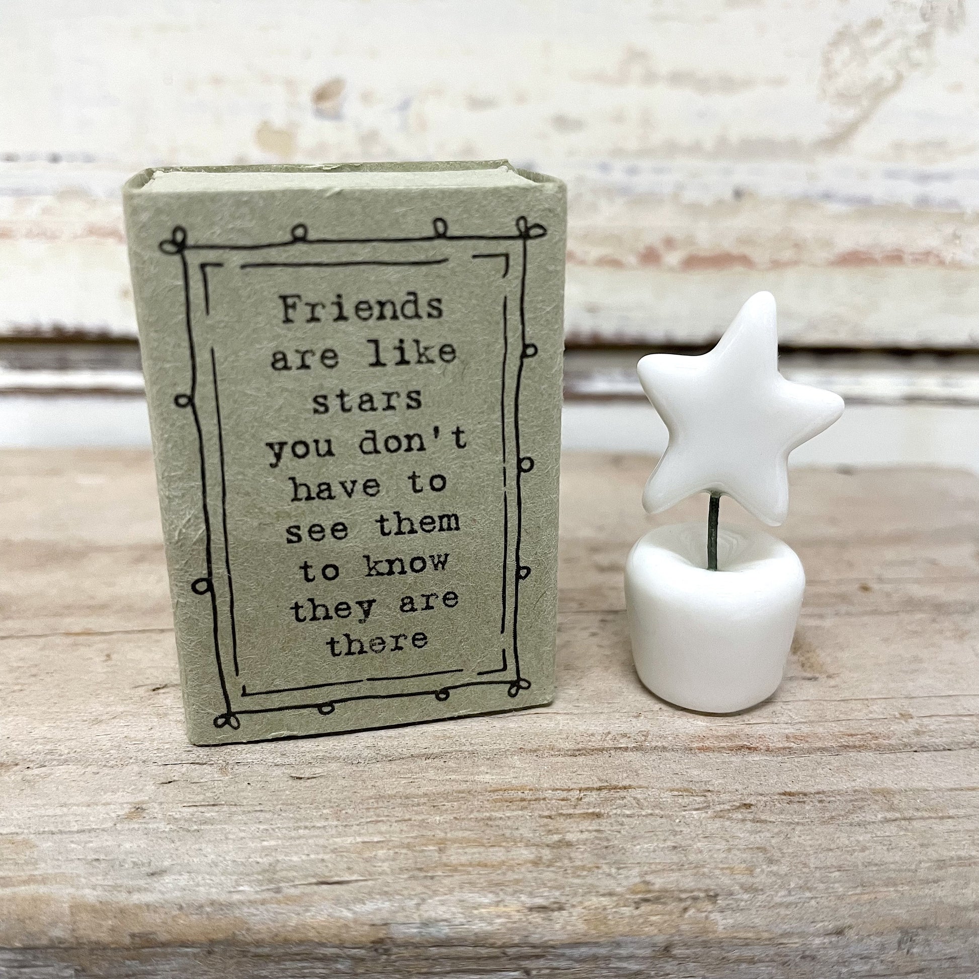 Heaven in Earth Matchbox Star tiny ornament of star in a matchbox that reads "Friends are like stars, you don't have to see them to know they are there"