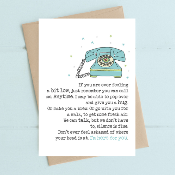A greeting card with a cartoon illustration of a telephone and a heart-shaped balloon, alongside a poetic message.