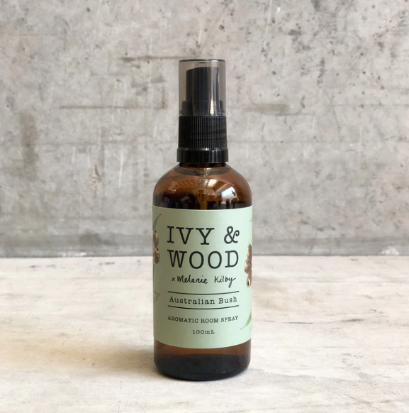 A brown bottle of Ivy & Wood Australian Bush aromatic room spray with a green label, Ivy & Wood - Australian Bush Room Spray